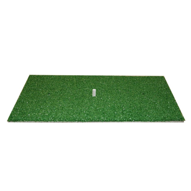 A green artificial turf golf hitting mat with a small white rubber tee in the middle, on a white background.