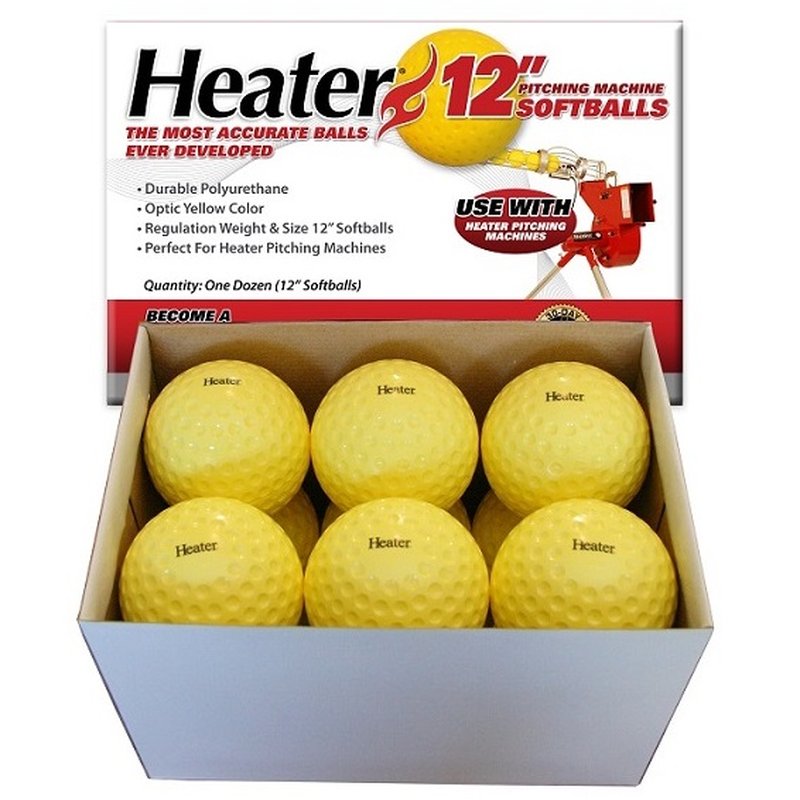 An open Heater 12 inch pitching machine softballs box holding yellow dimpled softballs, with red and black print on the lid.