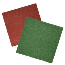 A clay coloured mat and a green mat overlapping on a black background.