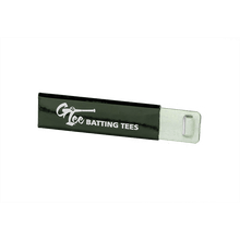 The G Tee cup cutter, a slim black tool with a printed label, on a black background.