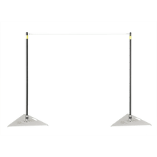 The G Tee Pitching Sticks photographed on a black background.