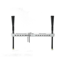 The G Tee 3N1 crossbar fitted to an upright, with two extra cup arms extending outward.