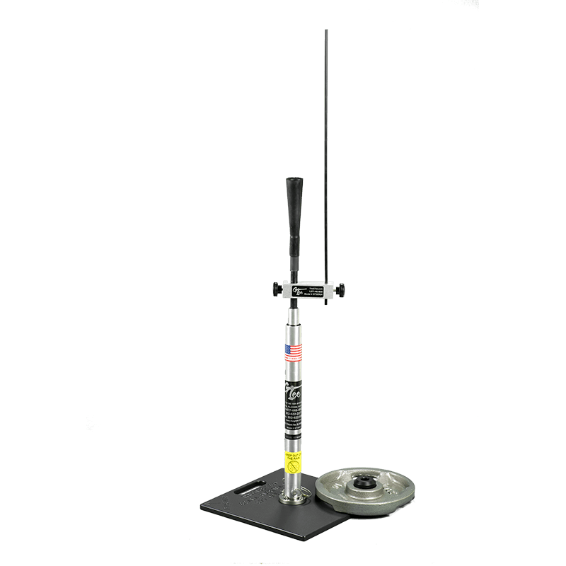 The Swing Extension Rod mounted on a tee upright above a round weight plate.