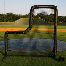 L Screen on baseball field in front of pitching mound with blue tarp covering it