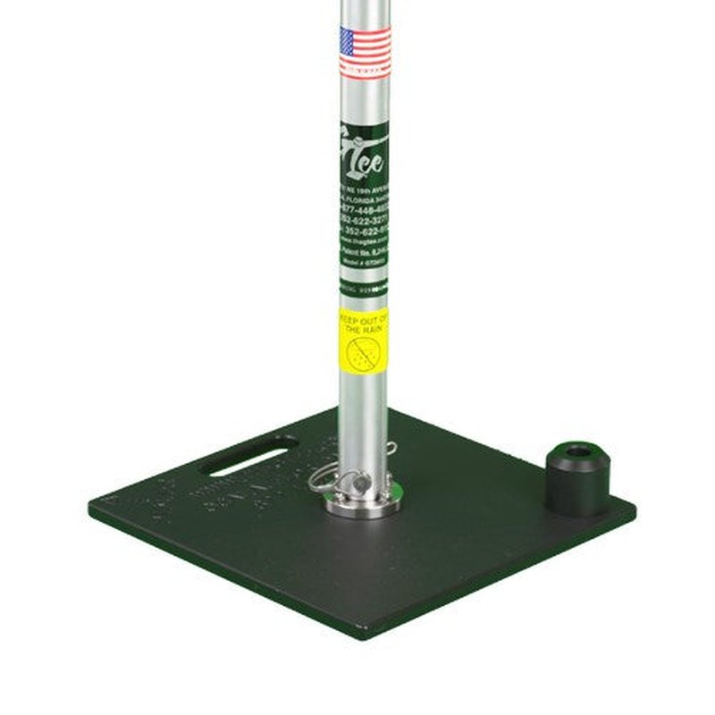 The G Tee Classic batting tee standing on its dark green square base with the upright extended.