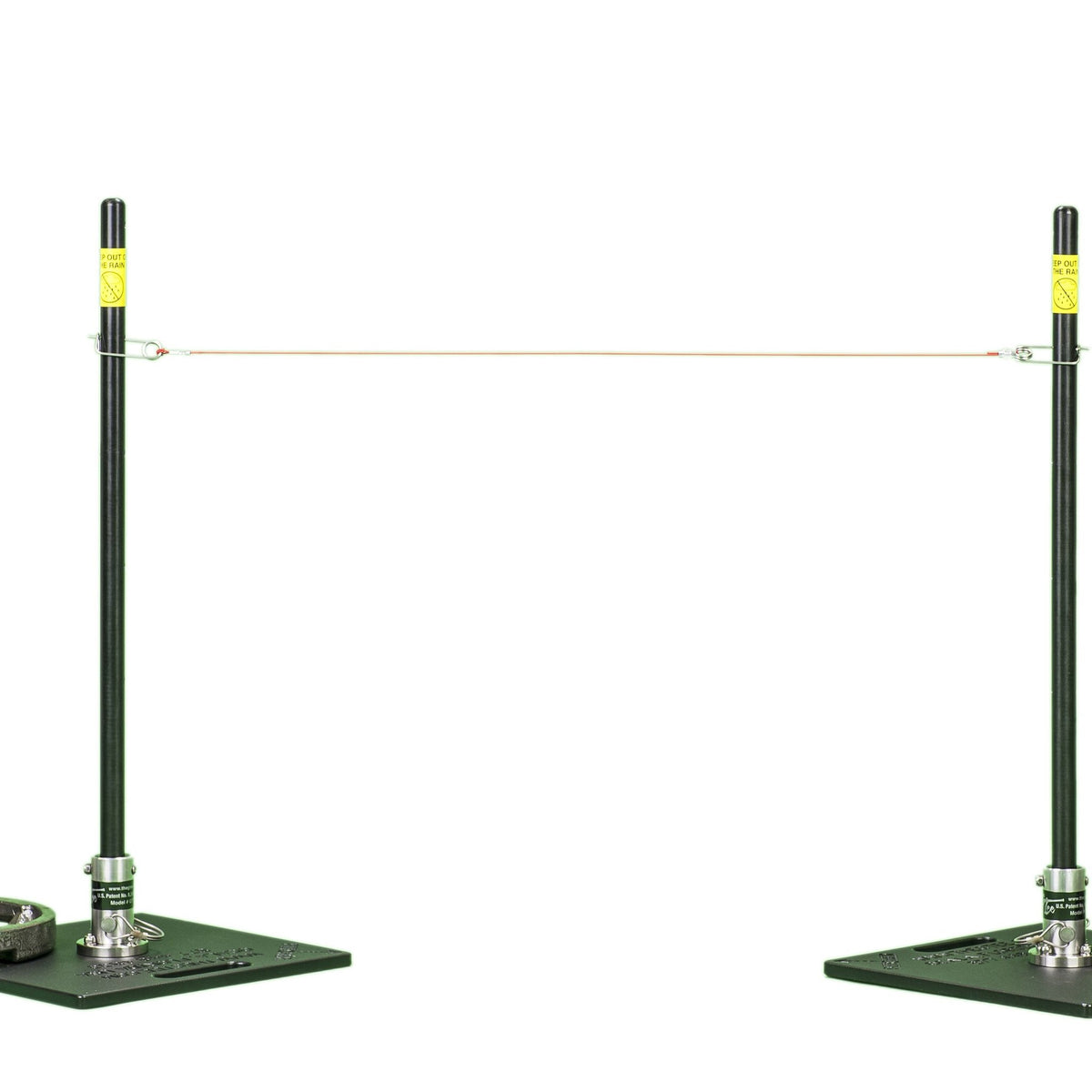 A pitching stick on a green base standing beside one on a stainless base.