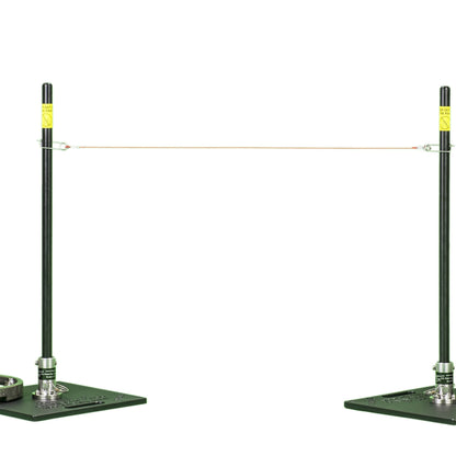 A pitching stick on a green base standing beside one on a stainless base.