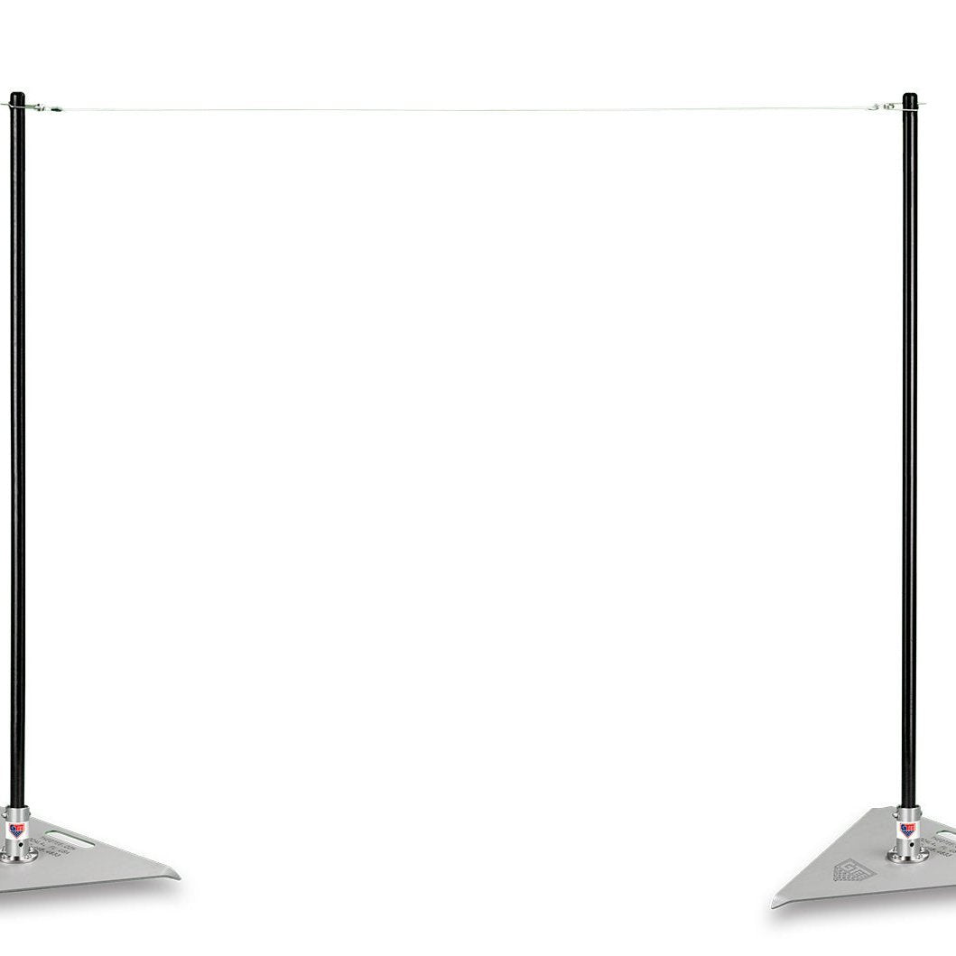 A single pitching stick and string photographed on a white background.
