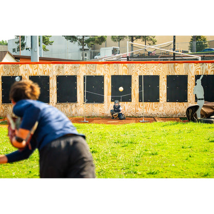 A player using the G Tee Strike Zone on a practice field, with G Tee branding across the frame.