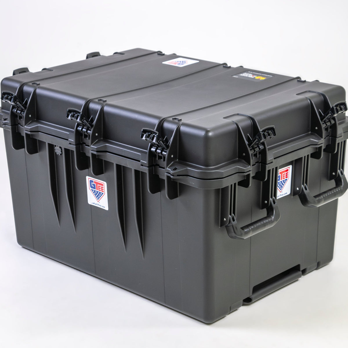 The closed case from the side, showing the row of press and pull latches.