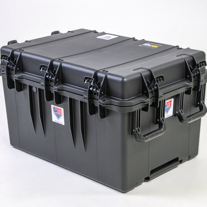 The closed case from the side, showing the row of press and pull latches.