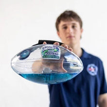 Clear water-filled training football with blue water inside, held out by its hand strap