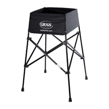 An empty black fabric ball basket with a JUGS logo sitting on tall black folding legs, on a white background.