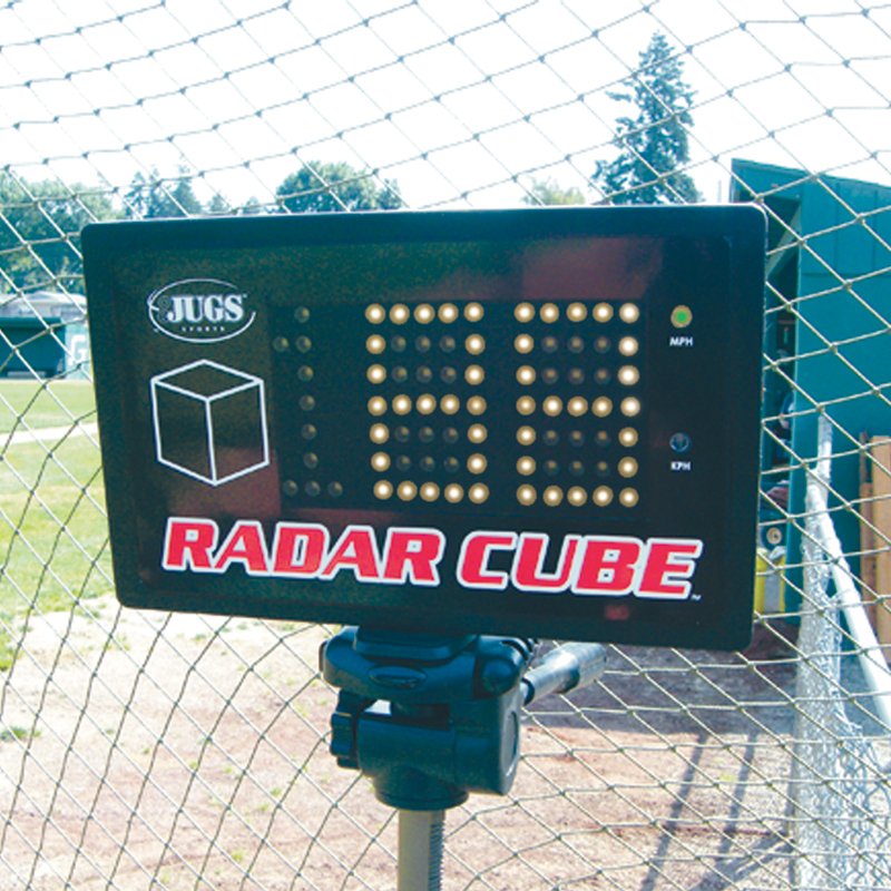 Close-up of the JUGS Radar Cube display on its tripod reading pitch speed.