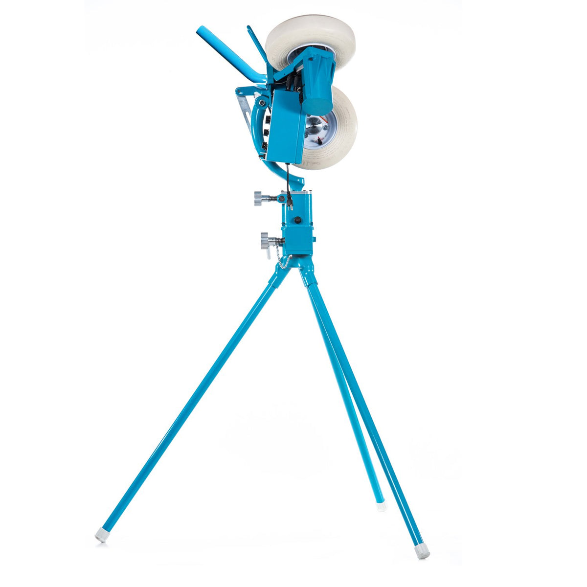 Side view of the JUGS BP3 baseball pitching machine on its tripod legs, showing the long feed chute and two of the three wheels, photographed on a white background.