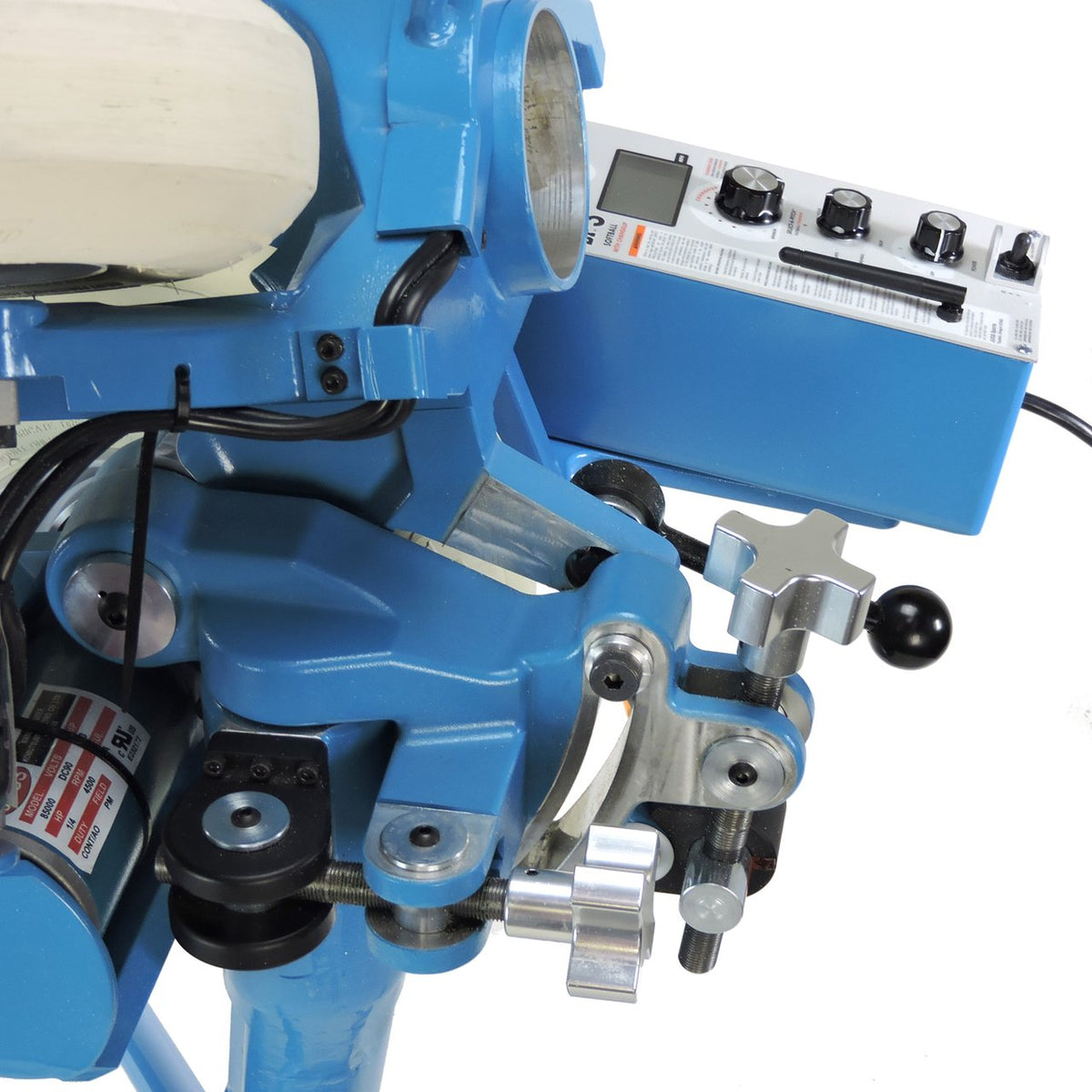 Close-up of the JUGS BP3 softball machine head showing the adjustment knobs, elevation handle and control box, photographed on a white background.