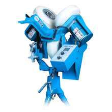 The light blue JUGS mini3 three-wheel baseball pitching machine included in the package, photographed on a white background.