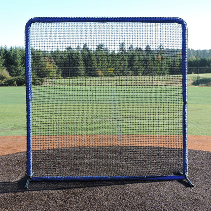 The JUGS Protector Blue Series 8-Foot Fungo Screen standing on a pitcher's mound.