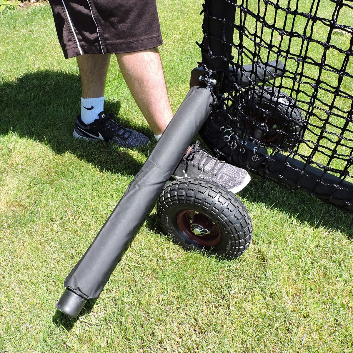 Close-up of a screen base tipped onto the JUGS Protector Series Wheel Kit for moving.
