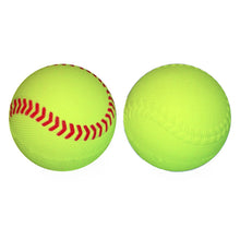 Two small yellow foam balls on a white background, one showing red stitching and the other showing its plain side.