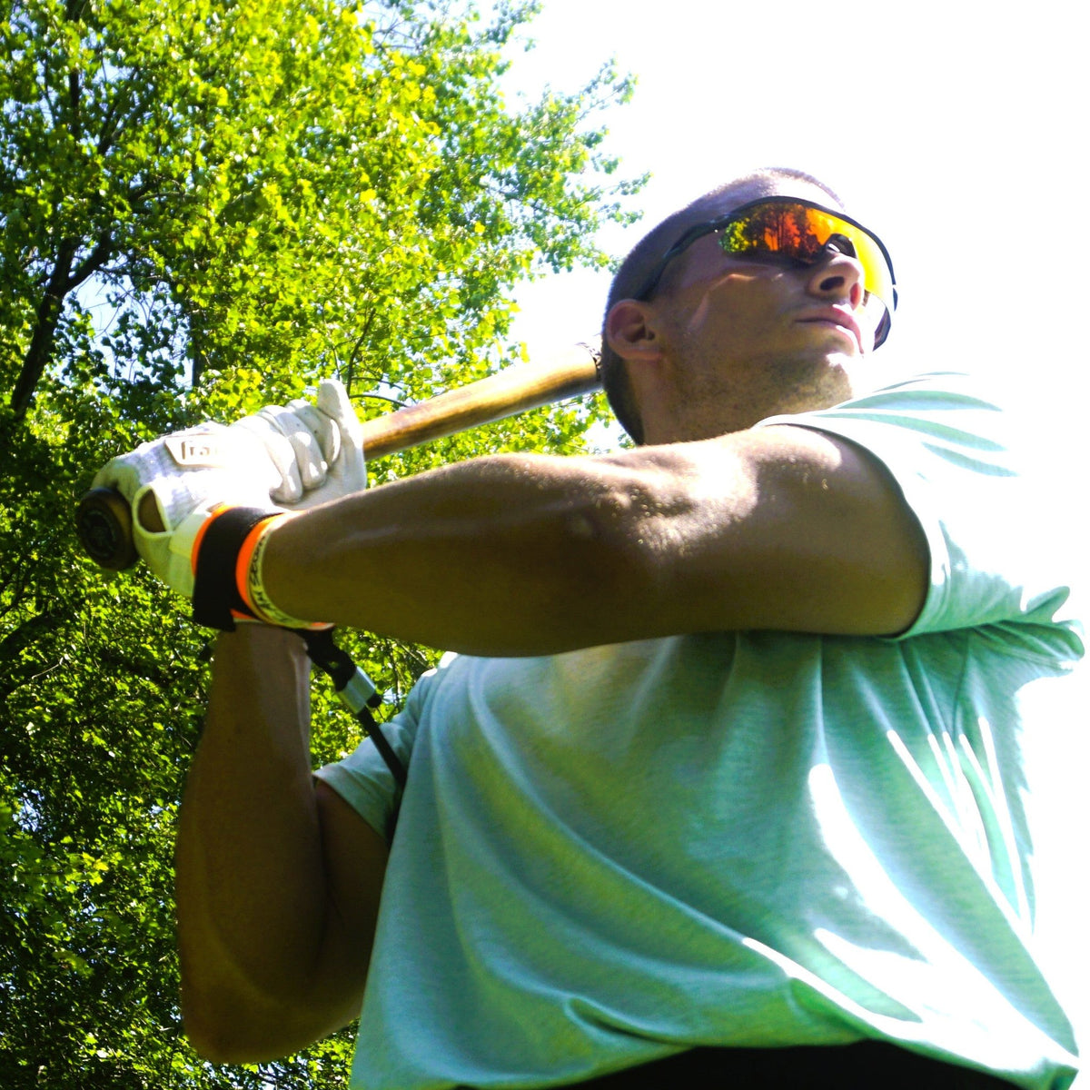 A hitter loads up to swing with the True Connect on the back arm.