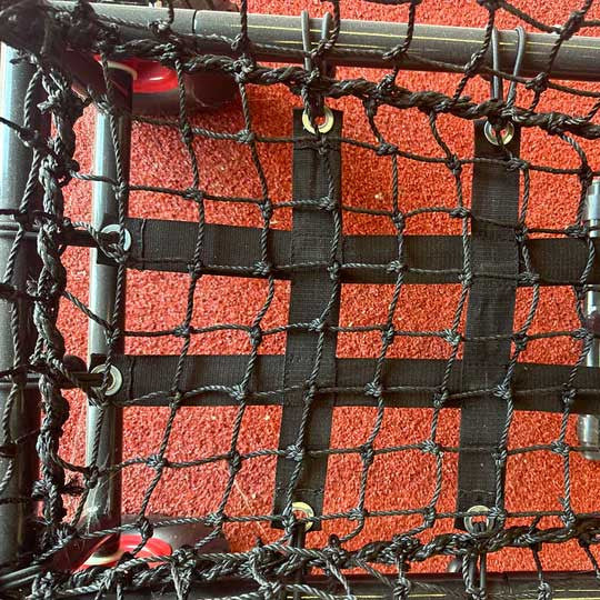 the netting inside the low ball cart with a red floor