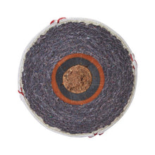 Cross-section of a baseball showing the cushioned cork center and wool windings