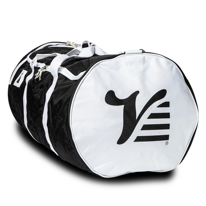Black Valle Eagle Catchers Duffle Bag lying at an angle, white end cap with the black Valle V logo