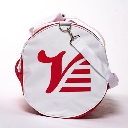 Red Valle Eagle Catchers Duffle Bag end on, white end cap with red Valle V and clipped shoulder strap