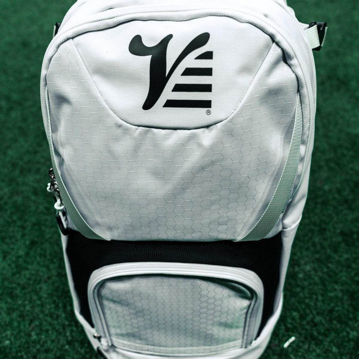 Valle Eagle White Baseball Backpack from above, showing the black Valle V on the white top panel
