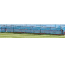A very long black netted backyard batting cage on a green lawn, seen from the side.