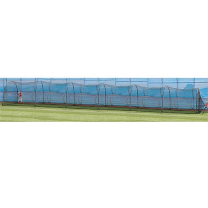 A very long black netted backyard batting cage on a green lawn, seen from the side.